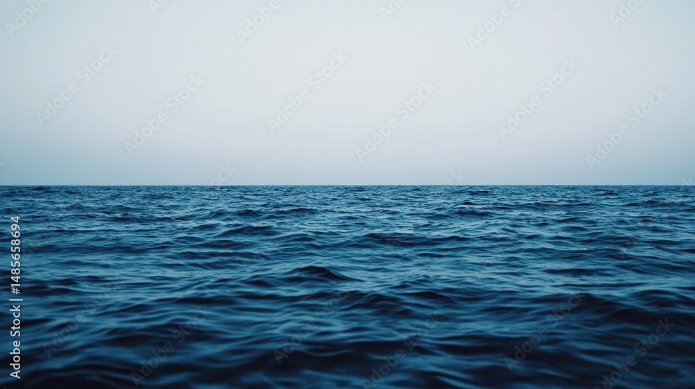 Poster Calm ocean waves gently rolling under a serene sky, creating a tranquil scene