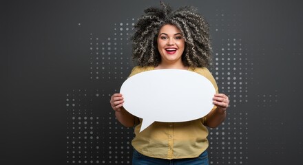 The woman is holding a large white speech bubble. Visual Concept.