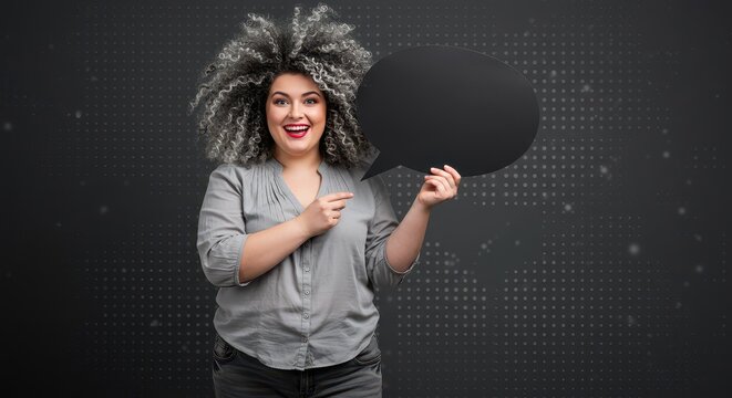 The woman is holding a large white speech bubble. Visual Concept.
