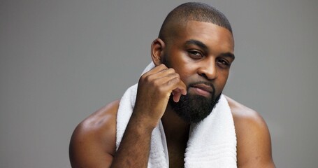 Shower, beauty and portrait of black man in studio for skincare, grooming and dermatology....