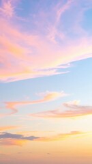 Fototapeta premium A vibrant blue sky stretches overhead, dotted with fluffy white clouds, creating a serene backdrop that evokes a sense of peace and tranquility.