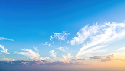 Fototapeta premium A vibrant blue sky stretches overhead, dotted with fluffy white clouds, creating a serene backdrop that evokes a sense of calm and tranquility.