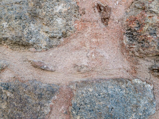 Closeup of old stone wall texture background