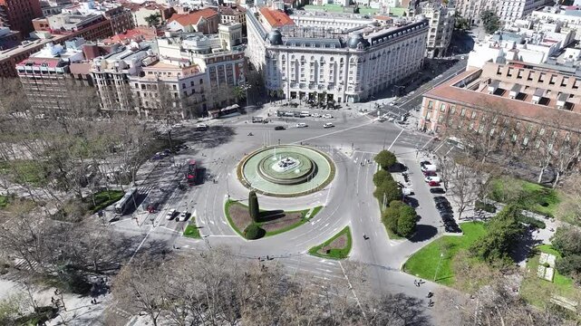 Neptuno Fountain At Madrid Spain. Famous Roundabout. Downtown Cityscape. Cultural Heritage Skyline. Neptuno Fountain In Spain. Madrid Street Scene.
