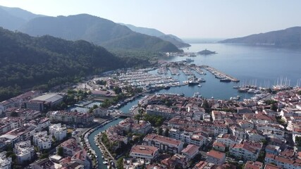 Marmaris, Turkey. - July 12, 2024: Marmaris city in Turkey, aerial view. Mediterranean Sea, streets and port