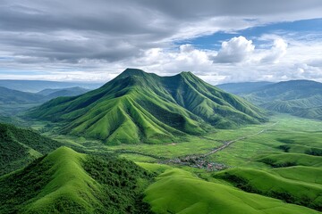 Fototapeta premium A village nestled inside the crater of a green mountain-planet