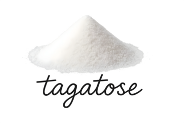 A pile of white powder labeled tagatose, a low-calorie sweetener derived from dairy products. Concept Tagatose Properties, Low-Calorie Sweeteners, Dairy Product Derivation, Health Benefits