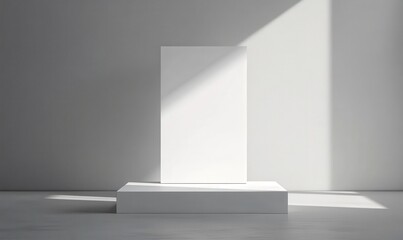 Blank poster on a minimalist white pedestal, sunlit room
