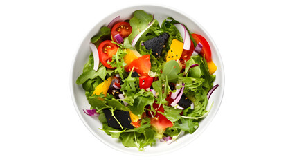 A top down view of a vibrant salad with mixed greens tomatoes onions and black sesame seeds