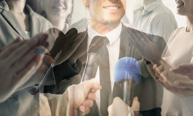 Group of people applauding to speaker, double exposure