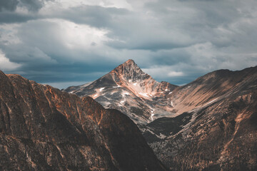 scenic wide landscape in the canadian rockies on a beautiful moody day with high contrast light and...