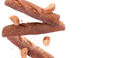 Fresh baguettes falling on white background. Banner design with space for text