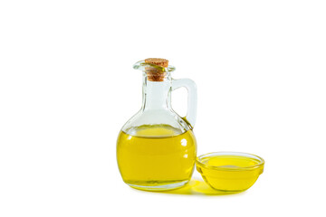 Extra virgin olive oil in a transparent jug and bowl.