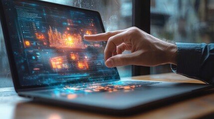 Close-up of a hand interacting with a futuristic holographic data interface projected from a laptop screen in a modern workspace