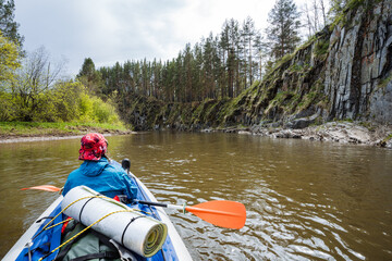 Embark on an unforgettable kayaking adventure along a serene and tranquil river, enveloped by lush...