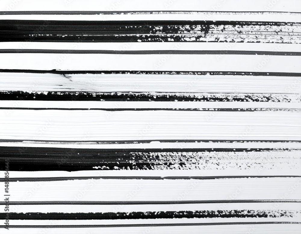 Poster a striking wall adorned with bold black and white stripes, creating a dynamic visual contrast that a