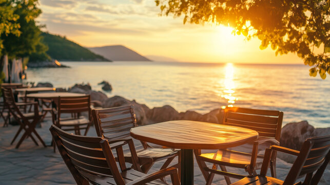 Scenic coastal view frames a well-set caf&Atilde;&copy; table near the sea