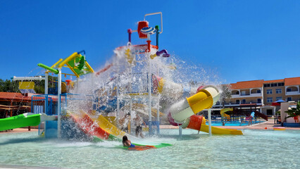 waterpark water slides aquapark summer playing and swimming for children