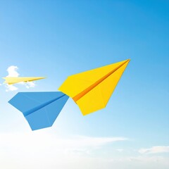 Two colorful paper airplanes soar gracefully through a bright blue sky, their wings catching the sunlight as they glide effortlessly among fluffy white clouds.
