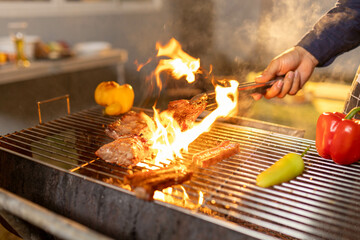 Juicy, tender steak sizzles over open flames on a rustic barbecue grill, with herbs and smoke enhancing the rich aroma of outdoor cooking.
