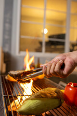 Juicy, tender steak sizzles over open flames on a rustic barbecue grill, with herbs and smoke enhancing the rich aroma of outdoor cooking.
