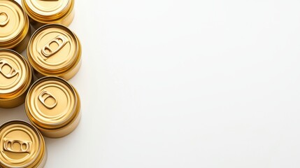A group of gold metal cans sits on a white background leaving plenty of copy space ideal for food product advertising or packaging design projects.