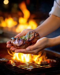 Hand holding grilled beef over BBQ flames