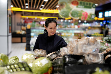 Woman Shopping for Produce at a Supermarket