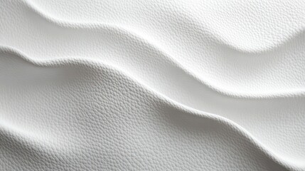 close-up of white leather texture with soft folds and natural grain detail showing light and shadow