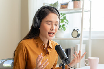 Close-up microphone on the table in podcasting record.