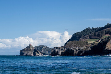 Gaztelugatxe hermitage overlooking the cantabrian sea in spain on a sunny day