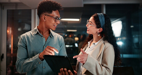 Business, employees and tablet in office at night for investment profit, exchange rate and stocks research. Trader, teamwork and overtime with digital app for trading deadline and economic update