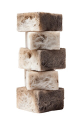 Stack of mushroom-mycelium packing blocks in studio-quality lighting on a white background