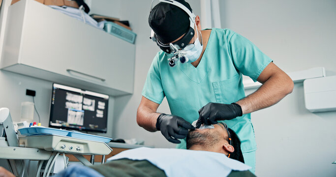 Appointment, oral exam and patient with dentist in office for checkup or mouth operation. Healthcare, medical hygiene or procedure with dentistry professional and man at clinic for dental surgery