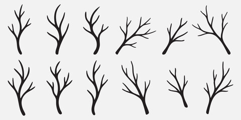 Naklejka premium A collection of black branch silhouettes in various natural shapes on a white background 