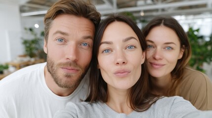 Close-up of Three Friends Taking a Selfie in a Bright Indoor Setting