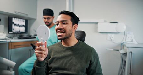 Man, mirror and dentist with teeth for dental care, hygiene or oral treatment at orthodontist. Male...