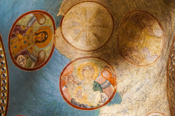 Beautiful fresco painting on the ancient orthodox church in Kyiv, Ukraine. Icons of angel and saints