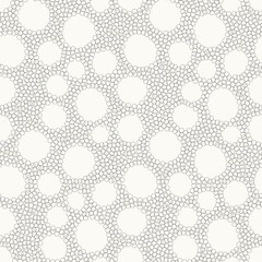 Vector seamless pattern. Free form organic shapes. Stylish smooth elements. Natural dotted rings. Hand made abstract background. Can be used as swatch. Monochrome smooth spotty print.