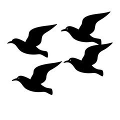 Four black bird silhouettes flying together in simple minimalist vector design