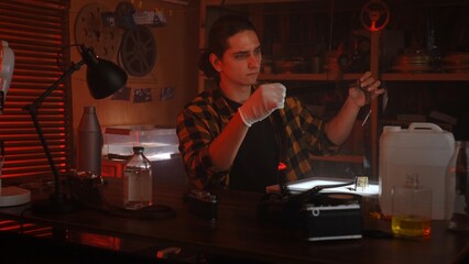 Film Development Process in a Professional Darkroom Setting