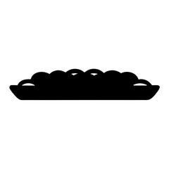Silhouette of a Tray Filled with Mounds of Round Food Items