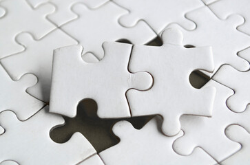 Obraz premium Connection of two puzzle parts in perfect harmony demonstrating logic clarity and teamwork in design