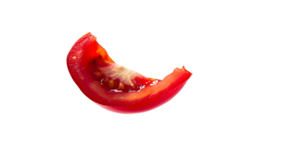 A single wedge of a ripe red tomato with seeds visible on a transparent background in sharp focus