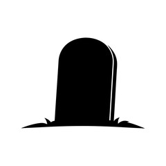 A spooky gravestone standing silently amidst the grass in the darkness