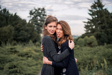 Fototapeta premium Daughter and mother hugging each other