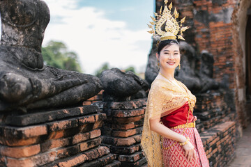 Traditional thai dress at ayutthaya temple cultural portrait historical environment joyful viewpoint