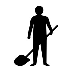 Silhouette of a person standing and holding a shovel, ready for work