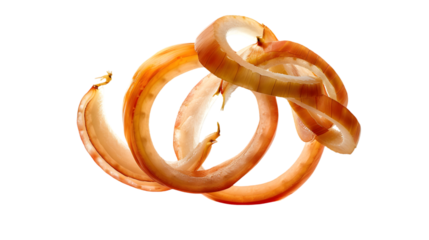 Close up of several onion rings stacked on top of each other against a black background in studio light