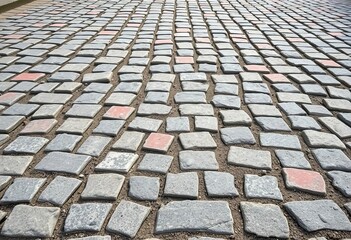 Fototapeta premium Abstract perspective of aged cobblestone pavement, textured stone surface, road, design